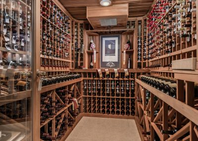 wine room with hundreds of bottles of wine and awards